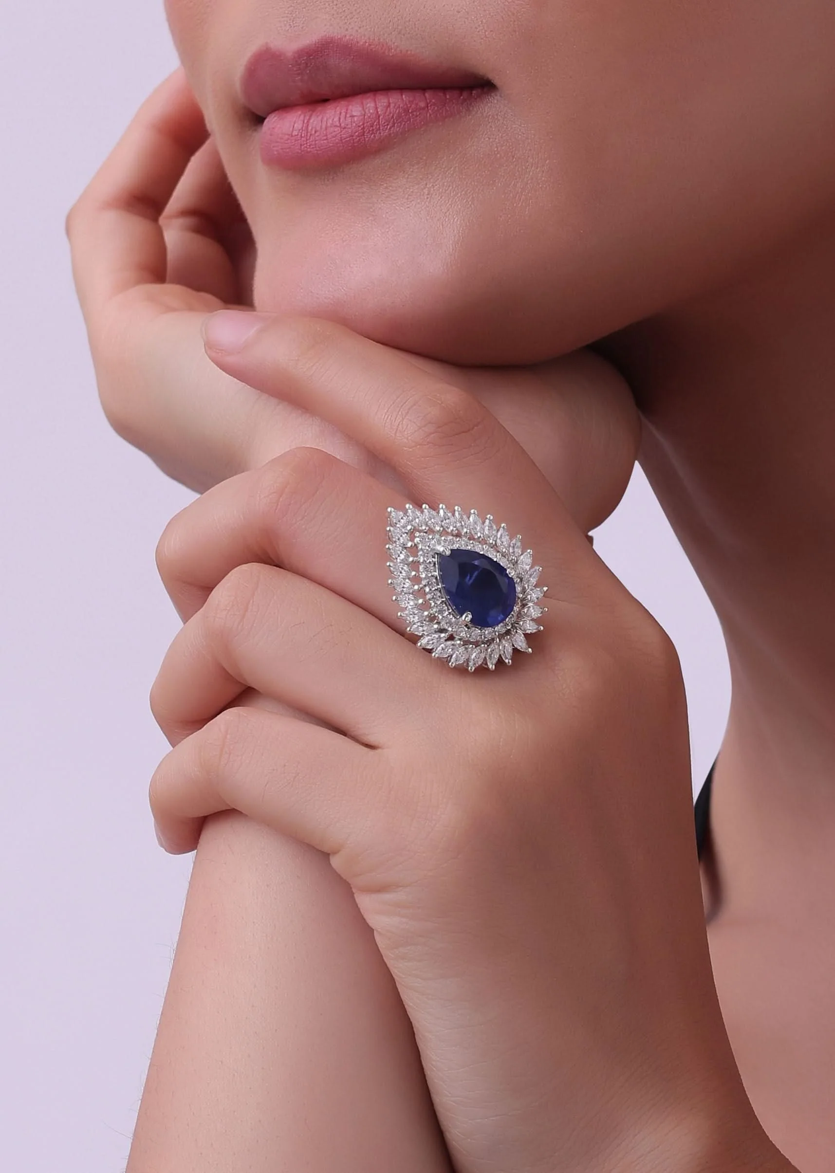 92.5 Sterling Silver Pear Shaped Ring Studded With A Sapphire Blue Synthetic Stone