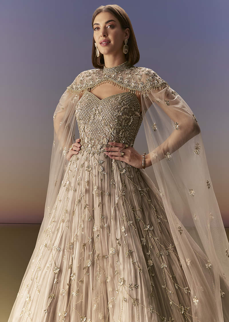 Beige Gown With Shoulder Cape And Rich Vertical Embroidery - Image 5