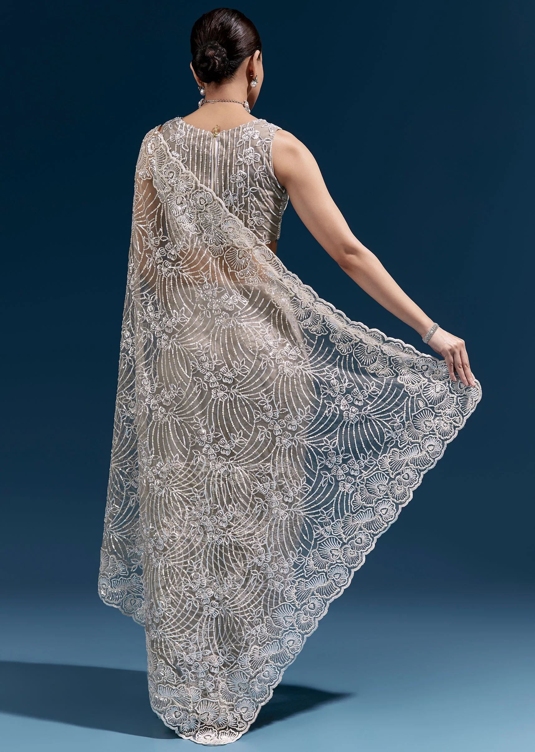 Dusky Beige Heavy Embroidered Net Saree With Cutwork Border And Floral Jaal - Image 4
