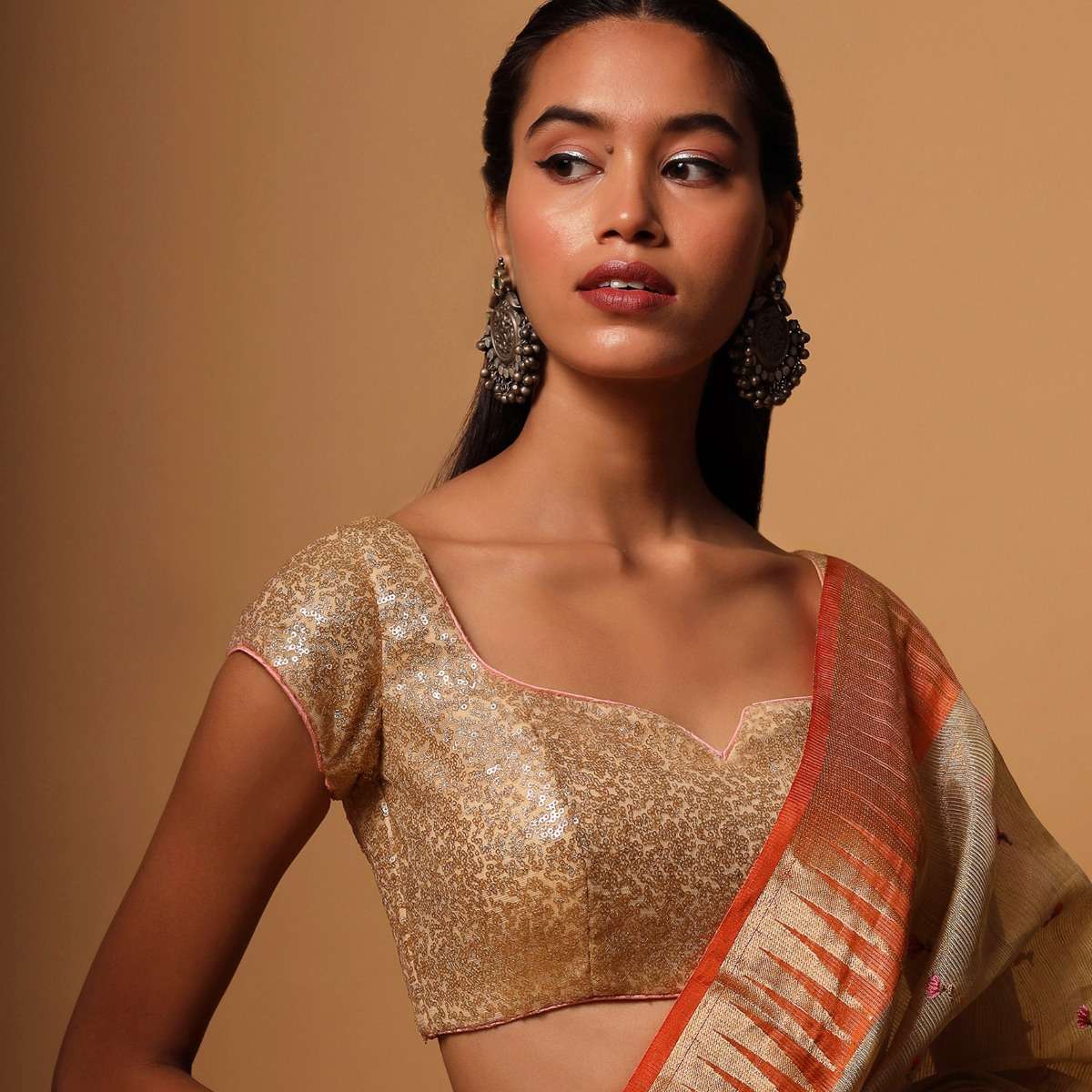 Gold Blouse In Net With Contrasting Peach Piping Around The Edges And Sequins Work All Over - Image 5