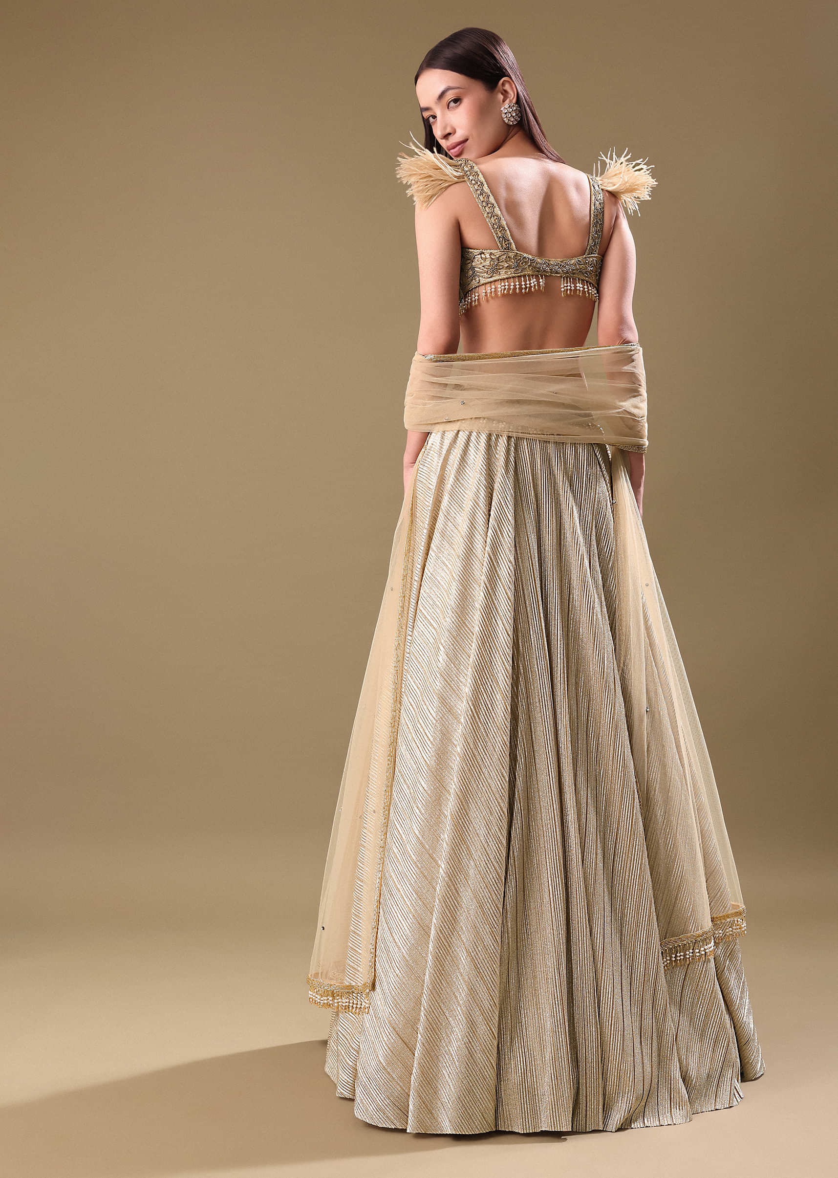 Gold Pre Pleated Lehenga With Embellished Blouse And Net Dupatta - Image 4