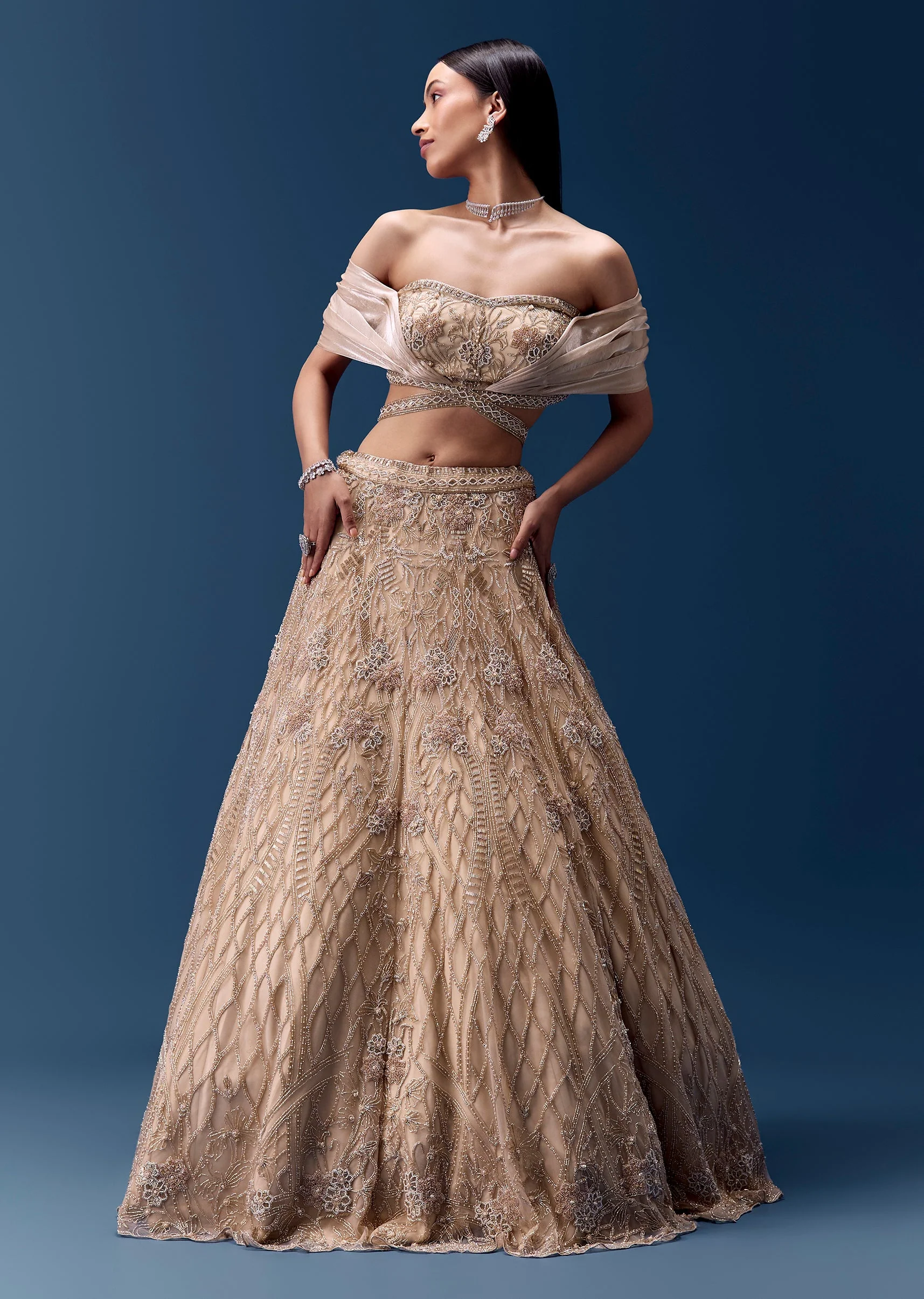 Ivory Off Shoulder Draped Blouse with Embellished Lehenga