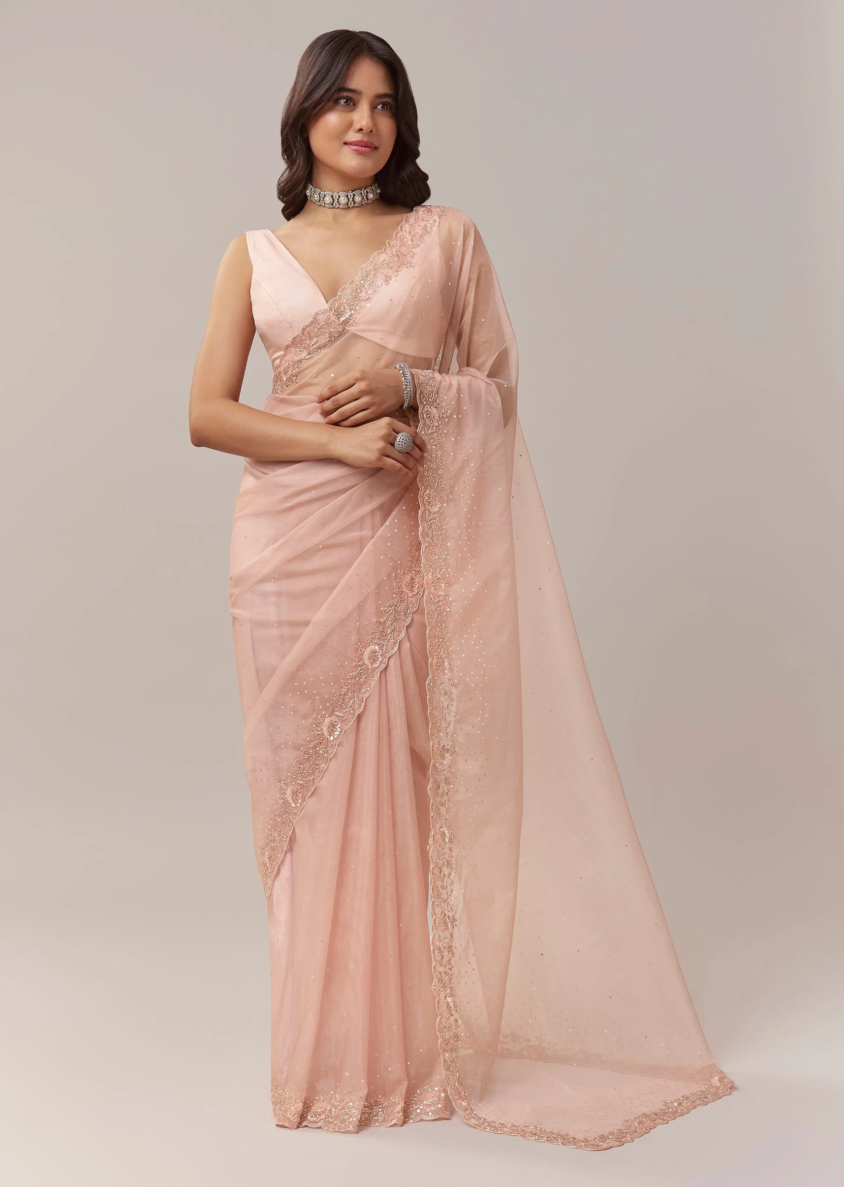 Light Peach Tissue Saree With Floral Embroidery And Sequin Detailing