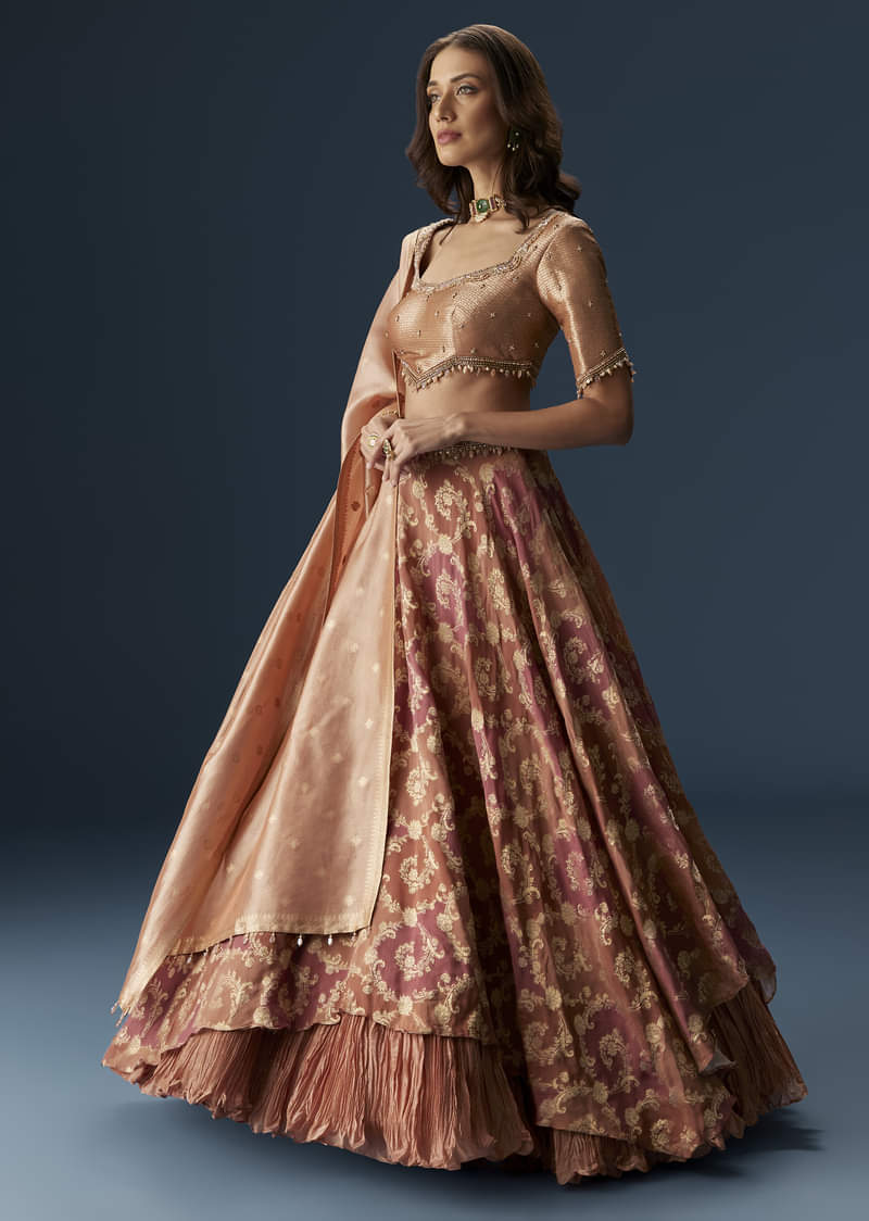 Orange Embroidered Blouse With Ruching Lehenga And Tassel Dupatta