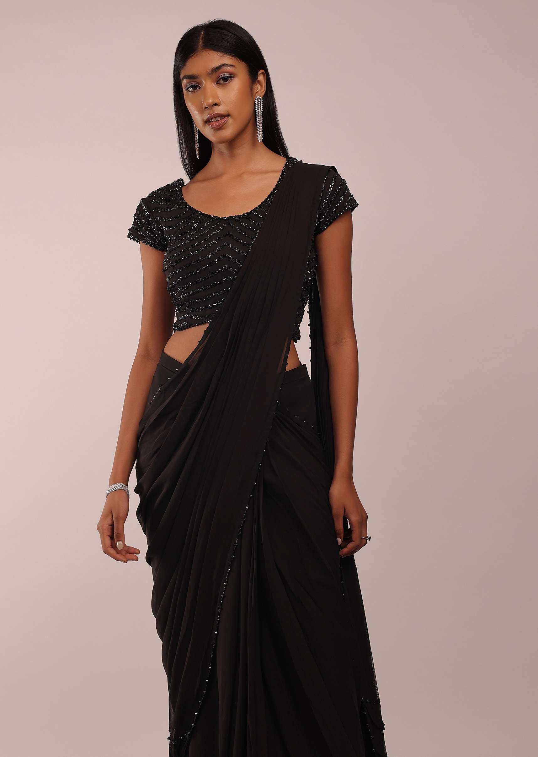 Pitch Black Saree With Three Tones Of Layered Frills On The Bottom Embellished In Stones And Sequins With A Tassel On The Pallu Corner - Image 2