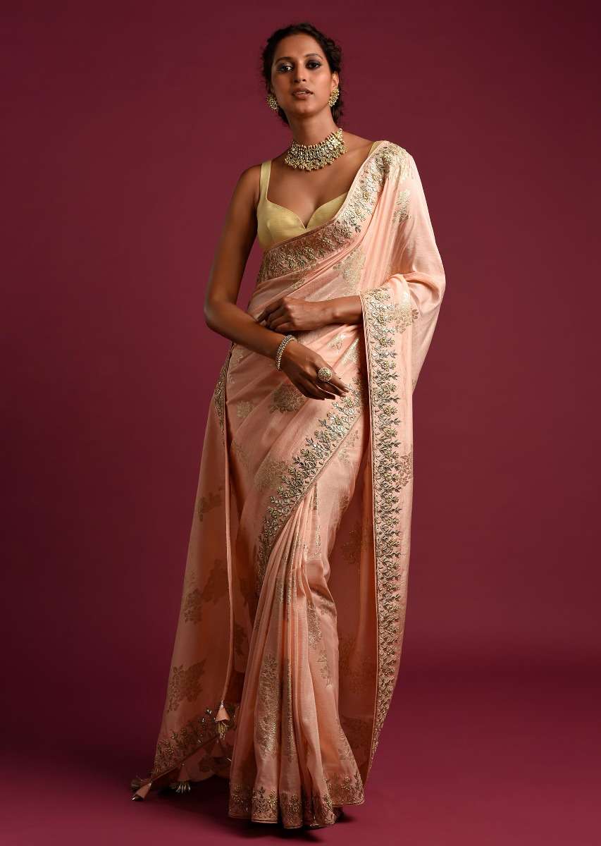 Powder Peach Banarasi Saree With Weaved Floral Motifs And Embroidered Border - Image 2