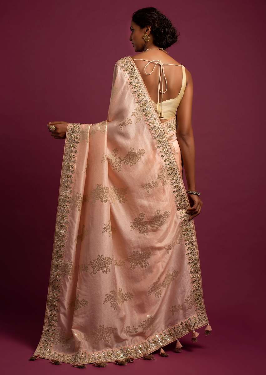 Powder Peach Banarasi Saree With Weaved Floral Motifs And Embroidered Border - Image 4