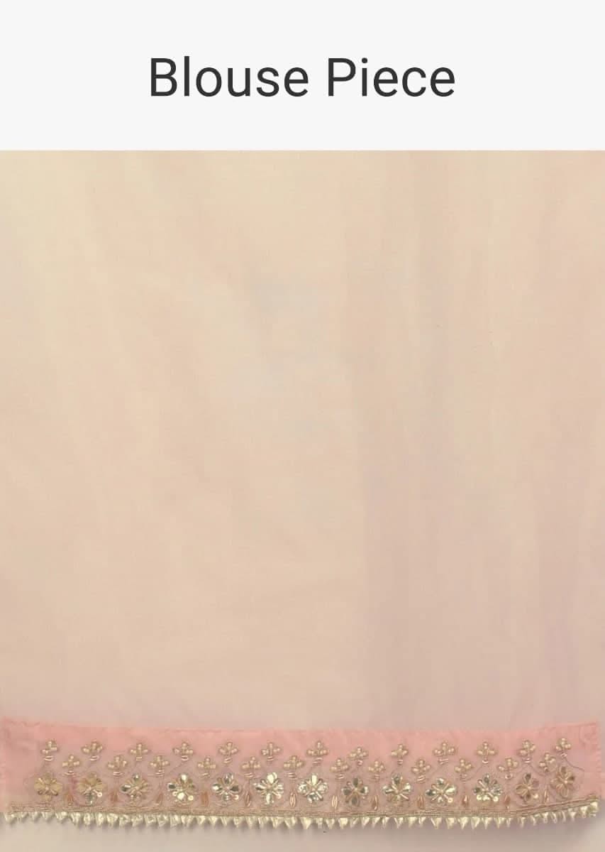 Powder Peach Banarasi Saree With Weaved Floral Motifs And Embroidered Border - Image 5