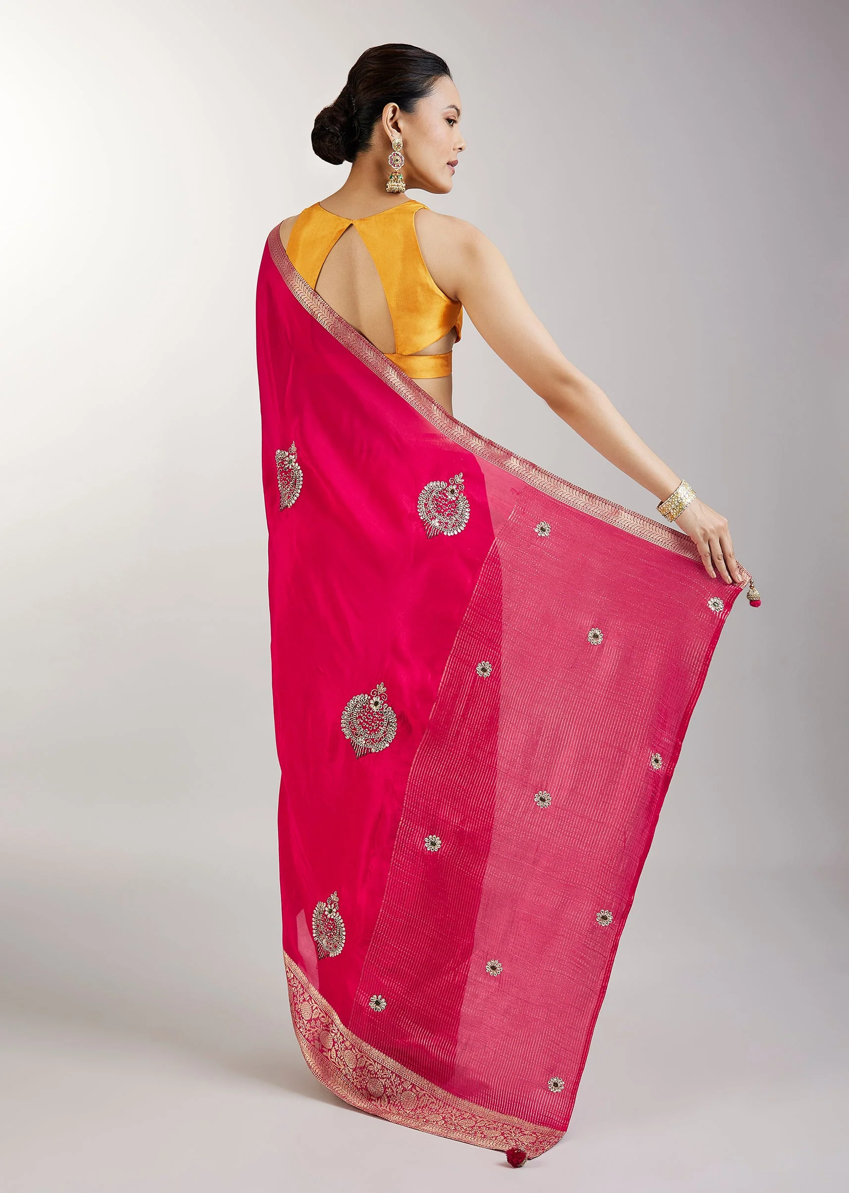 Rani Pink Crepe Saree With Embroidered Butti And Zari Border - Image 4