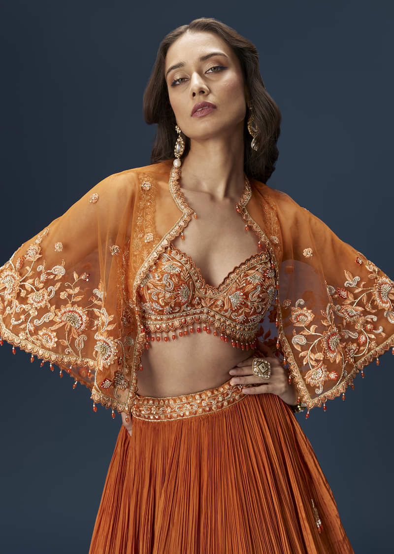 Rust Orange Embroidered Lehenga With Dramatic Cape And Blouse - Image 5