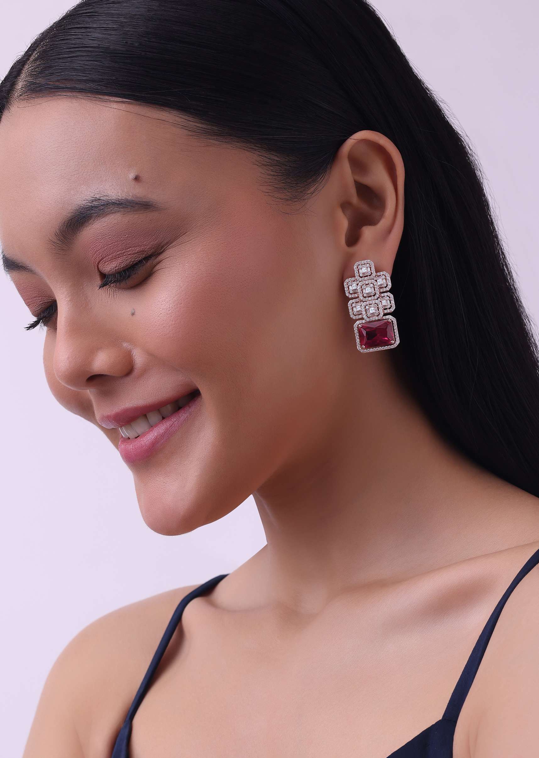 Silver Finish Studs Adorned With Synthetic Ruby Stone